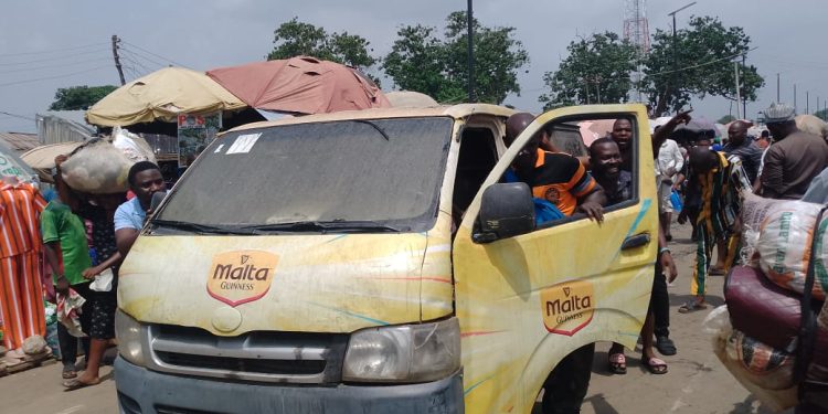 Goods burnt as fire guts delivery bus at Karmo Market in Abuja